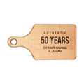 50th Birthday Engraved Cutting Board — “Authentic 50 Years of Not Giving a Damn”